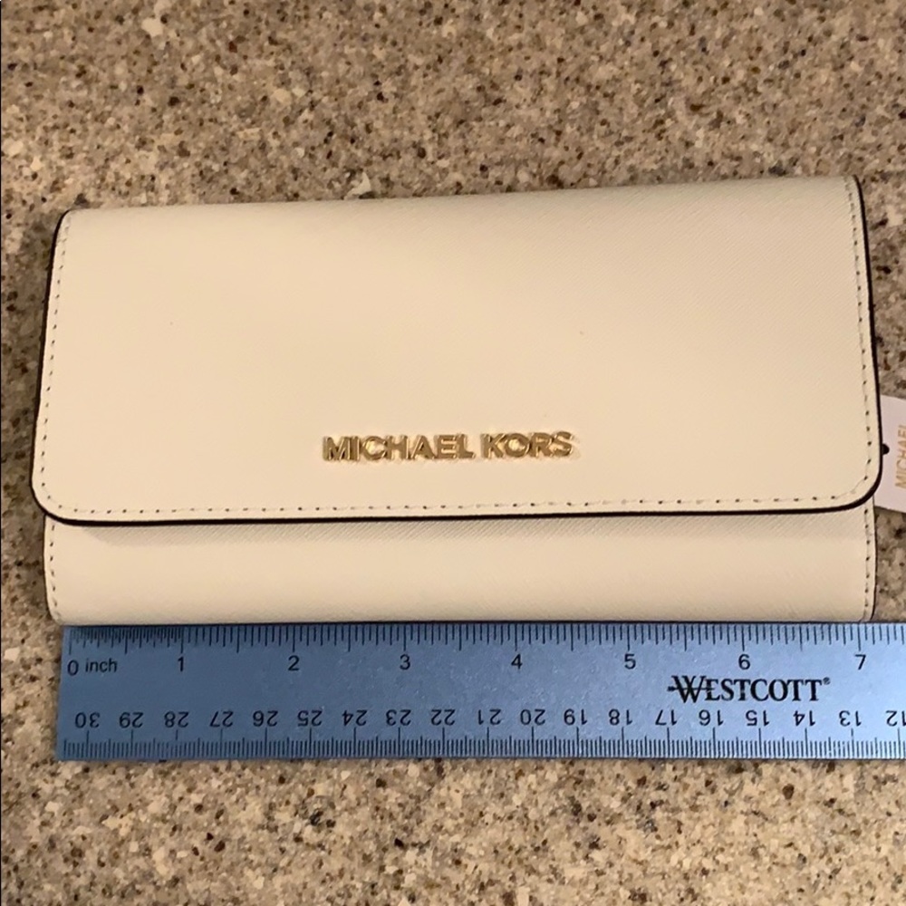 Michael Kors white wallet NWT.
